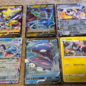 Pokemon Card Collection - Yellow, Green, Blue, Black